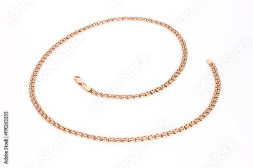 Gold chain on a white background. Gold