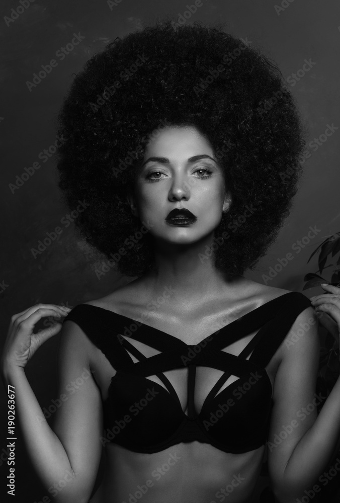 Girl in studio with an African hairstyle Girl in studio with an African hairstyle