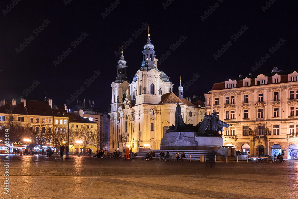 A night view of the beautiful St. Nicholas Church located in the historic Old Town Square in the city of Prague, Czech Republic