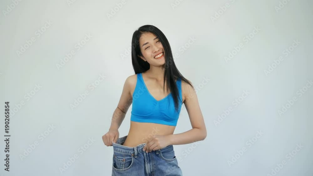 4k video of slim woman in old jeans showing thumbs up 4k video of slim woman in old jeans showing thumbs up