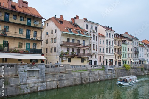 Old buildings along the bank of Ljubljana River in old Ljubljana in Slovenia