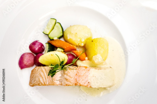 french cuisine dish with tomato and salmon