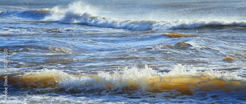Sea waves during high tide