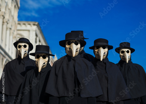 Plague Doctor Masks group, traditional costume invented in the 17th century and historical character of Venice Carnival