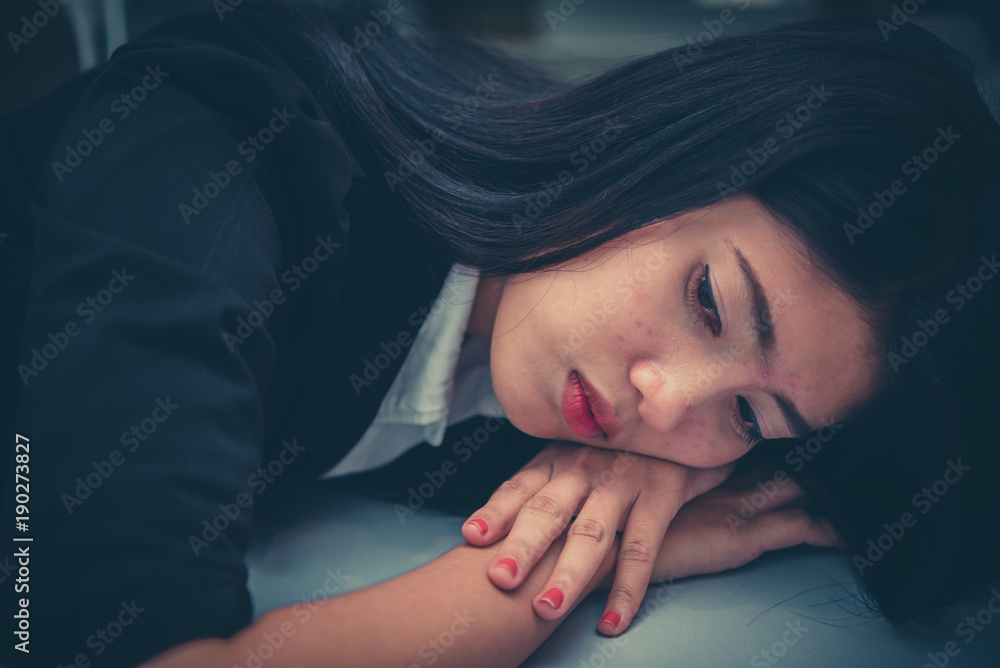 Close up sad woman in the office,stress girl from hard work,Heartbreak from boyfriend,Thailand people Close up sad woman in the office,stress girl from hard work,Heartbreak from boyfriend,Thailand people