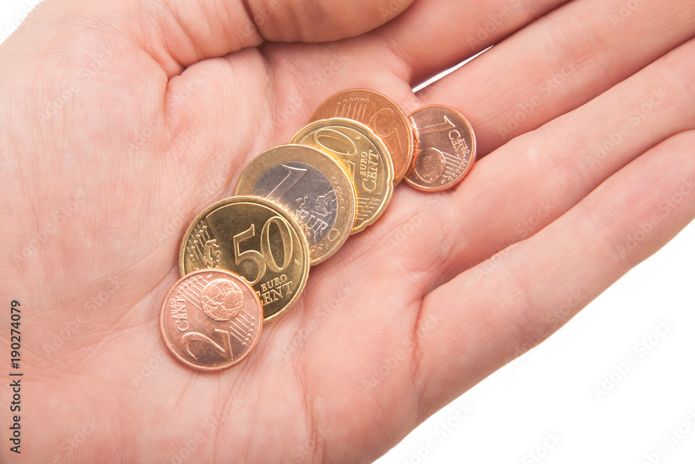 handful of euro coins in hand handful of euro coins in hand
