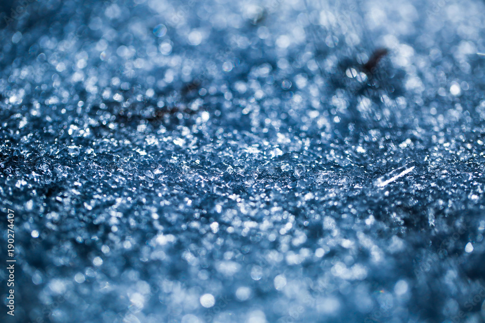Close-up of ice,Full frame ice background, frozen water, blue, December 25 morning grass in Portland Oregon USA Close-up of ice,Full frame ice background, frozen water, blue, December 25 morning grass in Portland Oregon USA