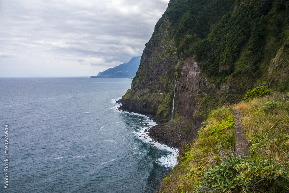 Bridal Veil Falls (Véu da noiva) and the old cliff road North Coast of Madeira island, Portugal