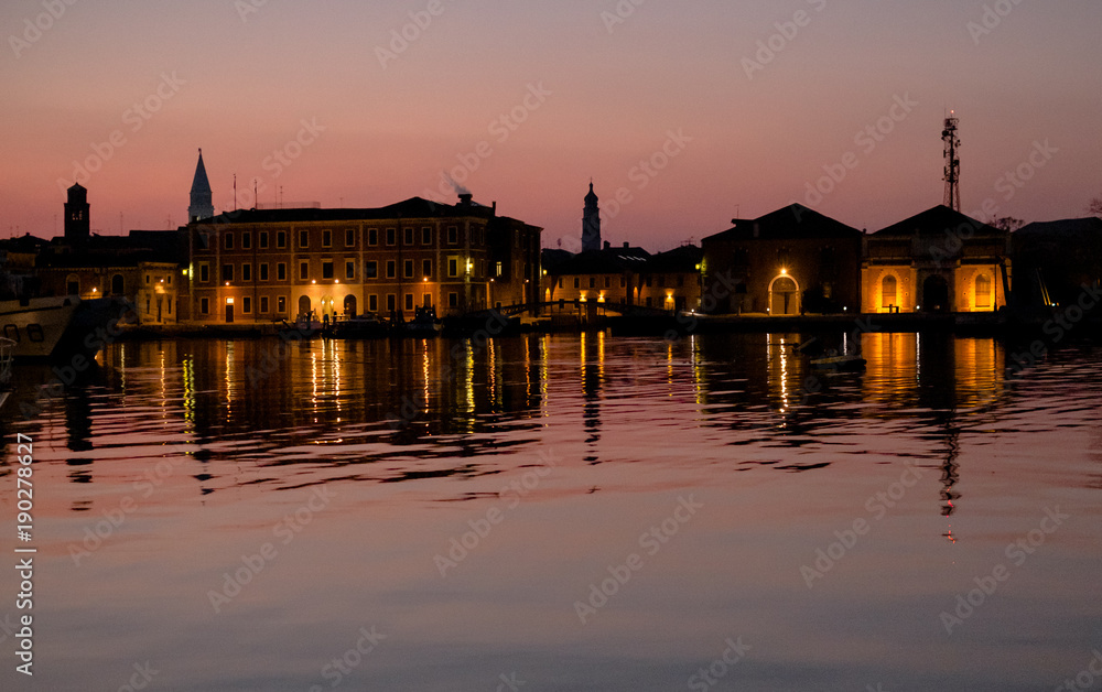 Naklejka premium Twilight view on the naval arsenal of Venice, italy.