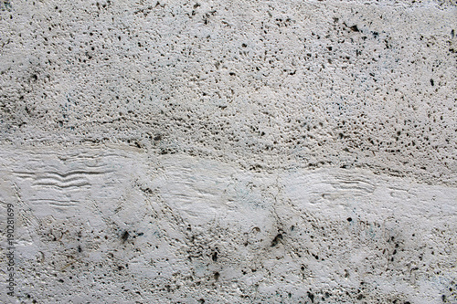 Tableau sur toile Porous plaster surface on a building wall