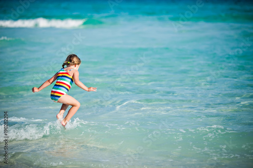 Little Girl Playing in the Waves