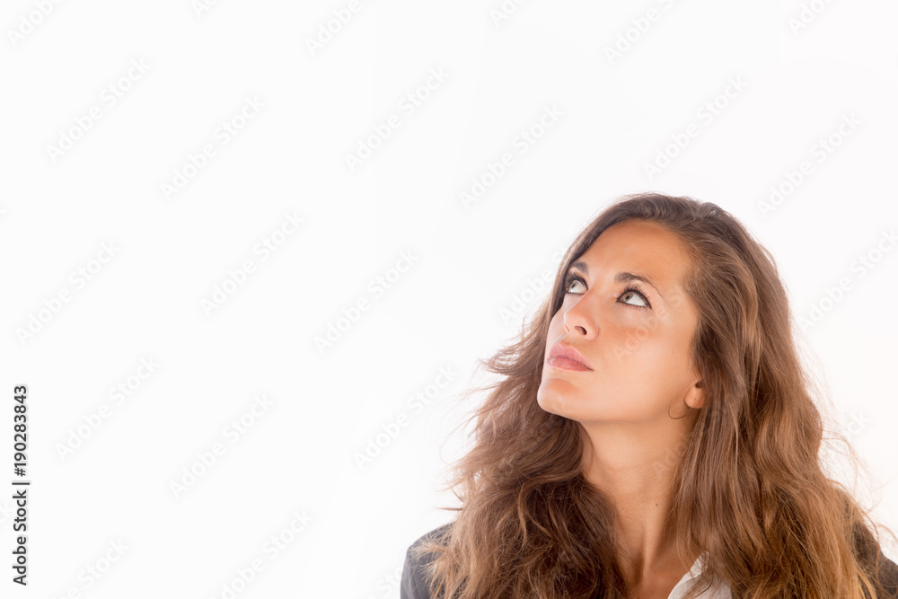 Pensive and worried business woman, looking on the left. Copy space photo, wide horizontal size. Pensive and worried business woman, looking on the left. Copy space photo, wide horizontal size.
