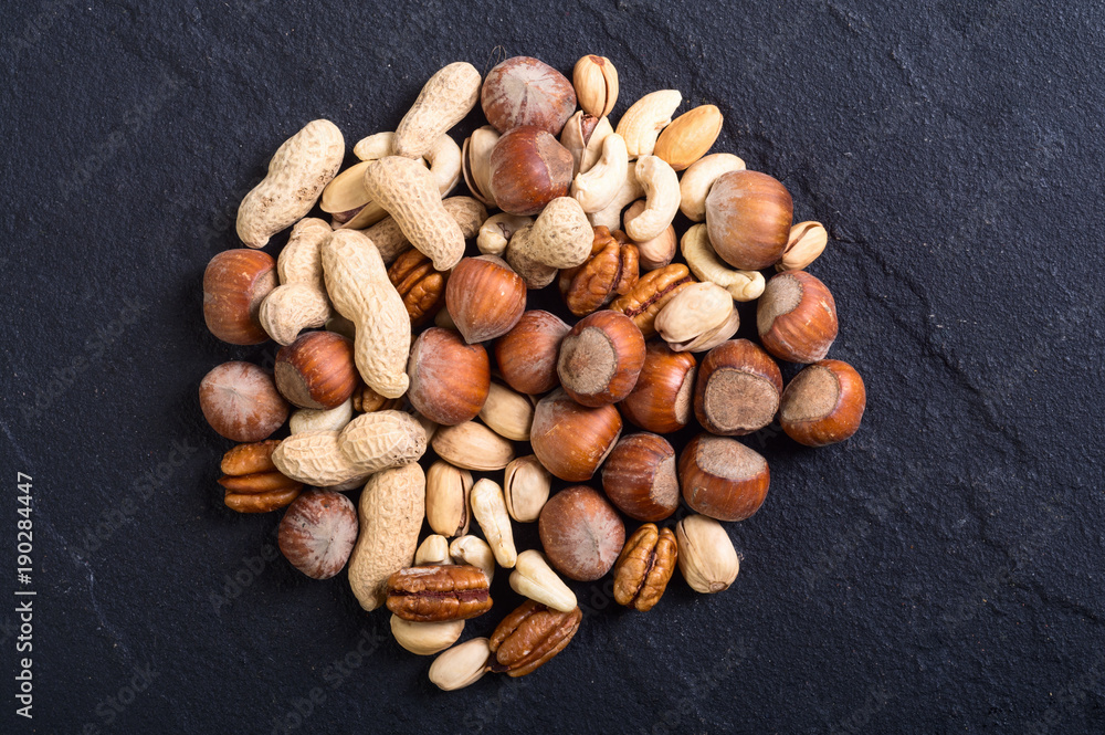 Mix of nuts in plate Mix of nuts in plate