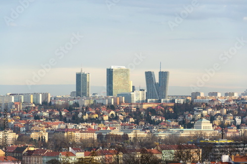 Panoramic view of the Pankrac district with Prague tallest buildings City Tower, City Empiria and V Tower seen from Smichov Mrazovka park in Prague, Czech Republic photo