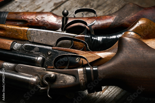 Different types of ancient hunting shotguns photo