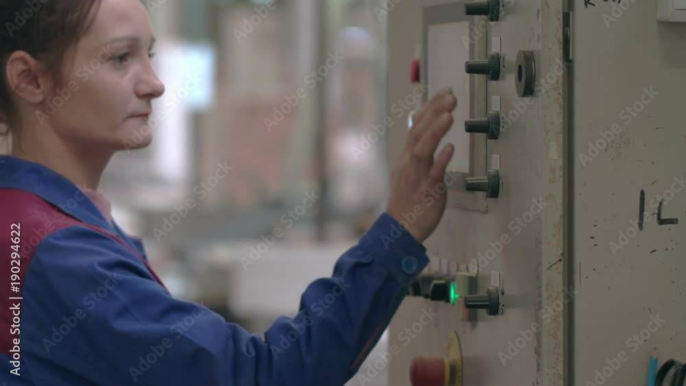 Woman Enter data on the machine Woman Enter data on the machine