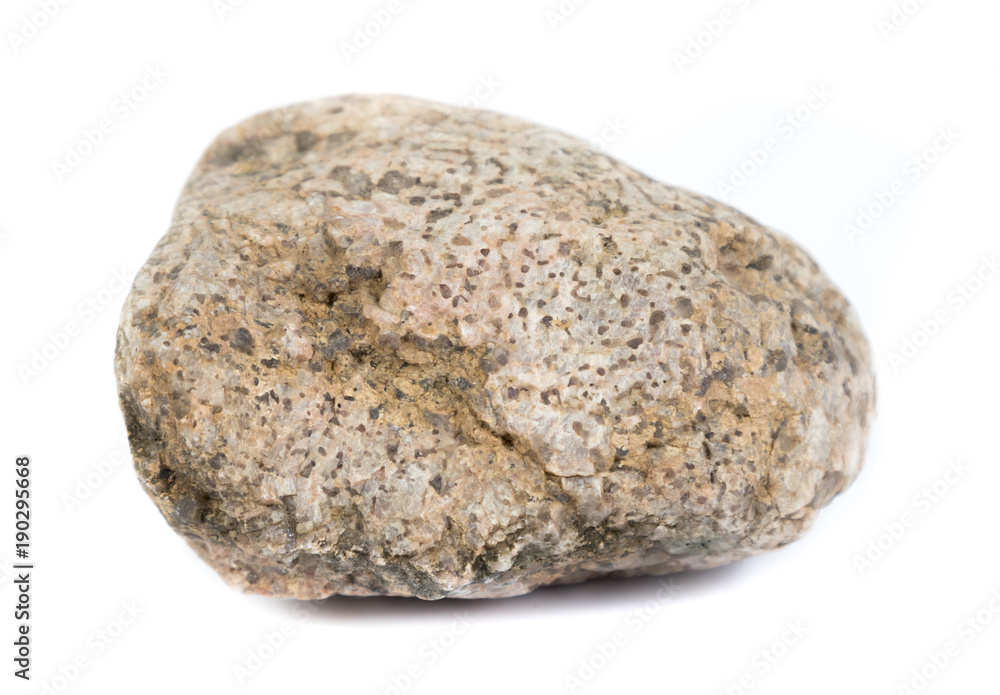 Single natural stone on white background, close-up Single natural stone on white background, close-up