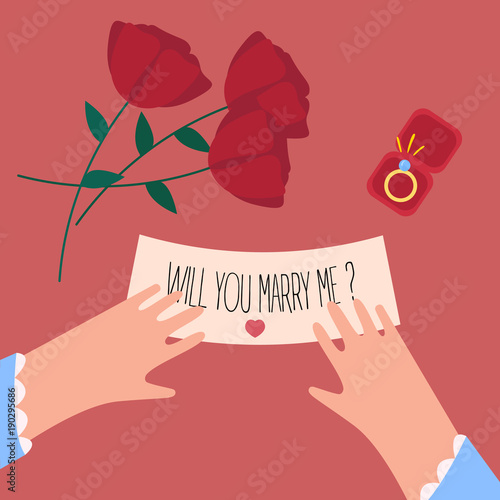 Female hands, will you marry me note and ring