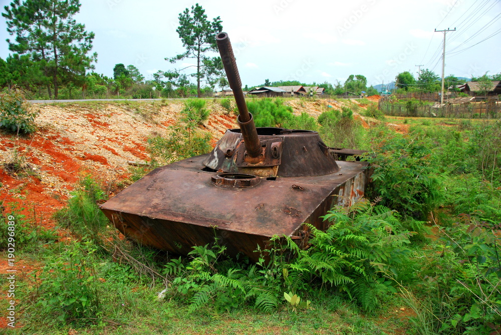 The remains of a bombed out Russian tank used by the Viet Cong in Loas ...
