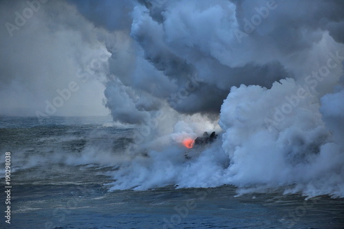 The hot lava of the Hawaiian volcano Kilauea flows into the waters of the Pacific Ocean © Oleksandr Umanskyi