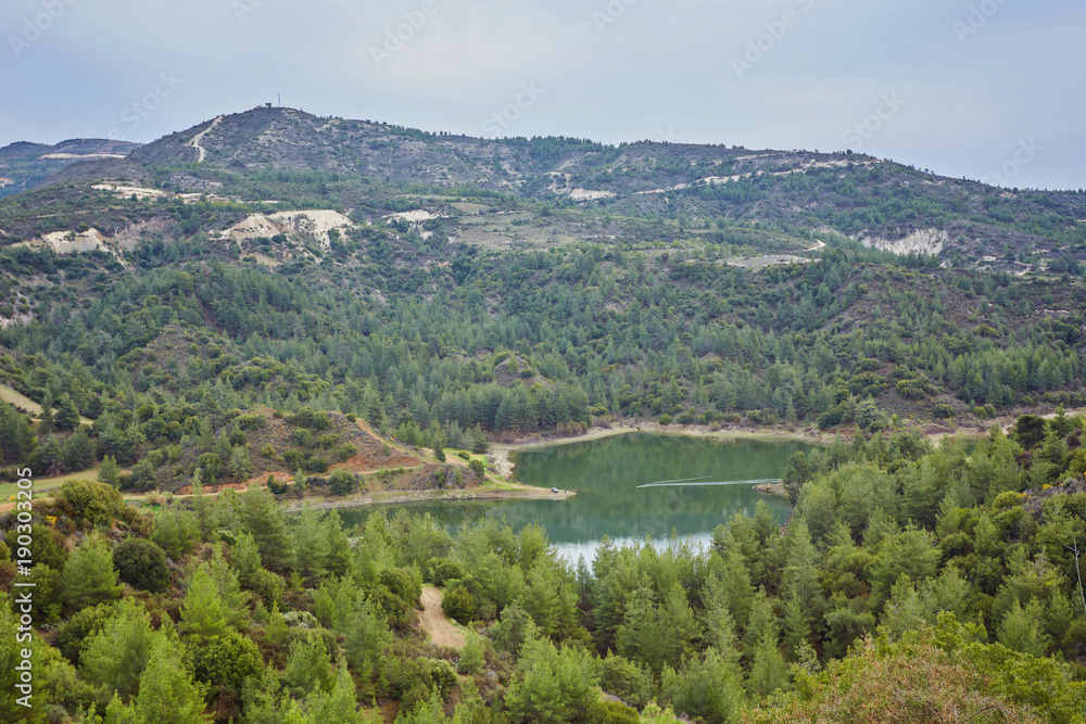 Palaichori dam among the pines in Troodos mountains, Nicosia District, Cyprus.