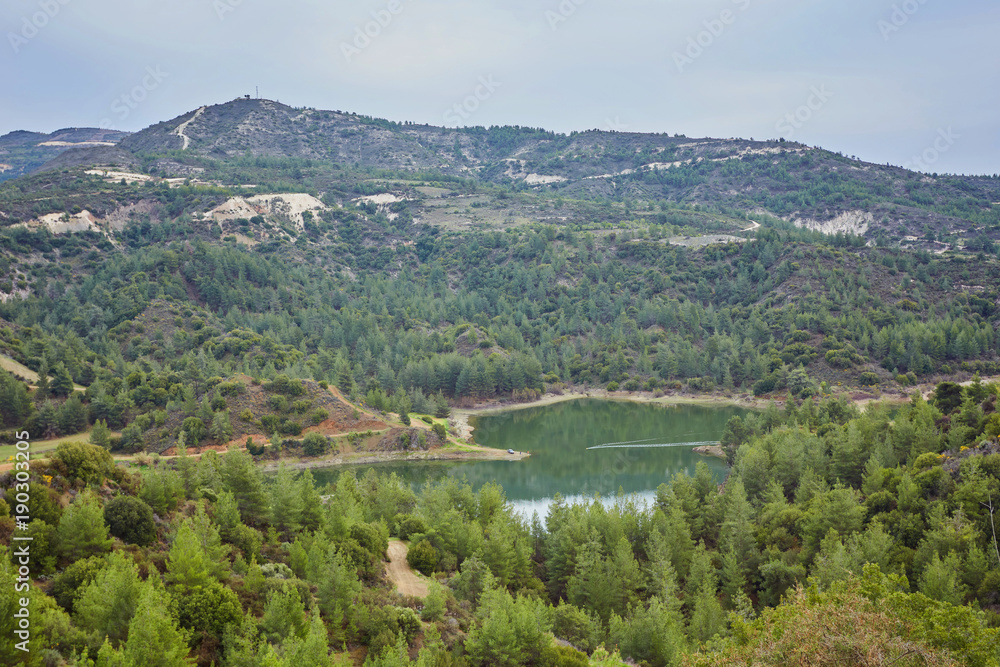 Obraz premium Palaichori dam among the pines in Troodos mountains, Nicosia District, Cyprus.