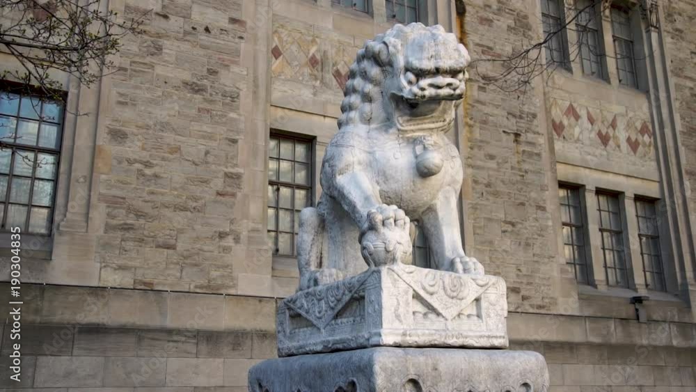 Smooth tracking shot around the Guardian Lion outside of the Royal Ontario Museum Smooth tracking shot around the Guardian Lion outside of the Royal Ontario Museum