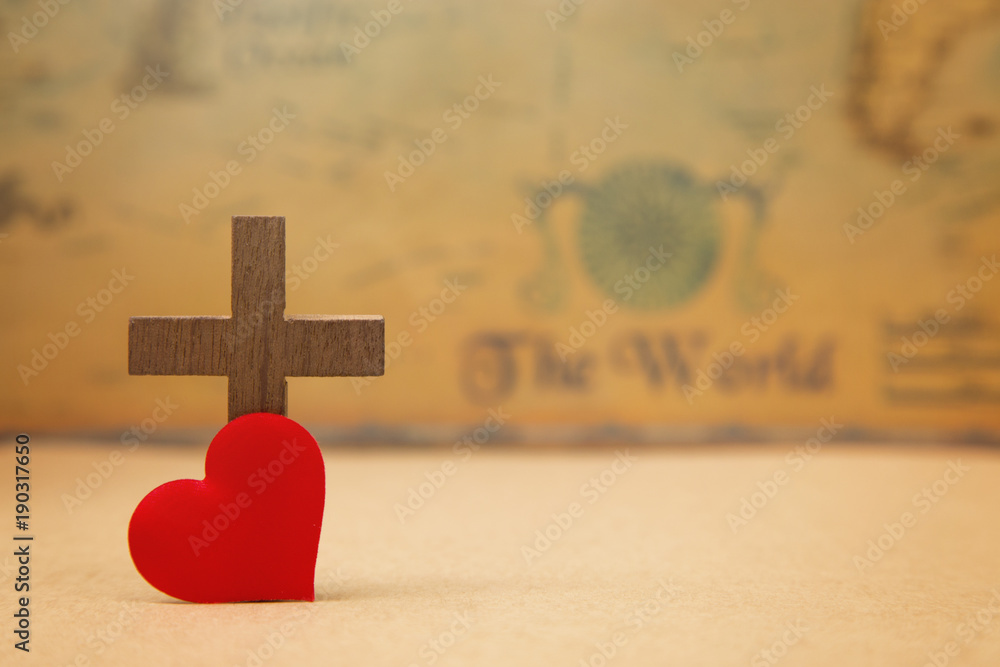 Obraz premium For God so loved the world - A Cross on a rustic world map