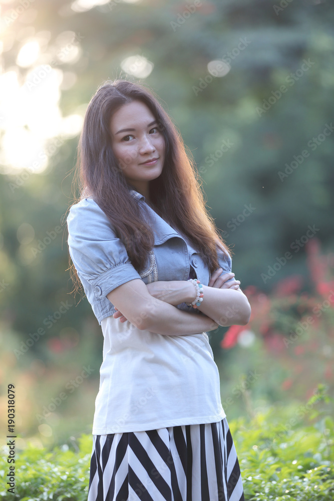 Portrait asian woman with our door park nature background Portrait asian woman with our door park nature background