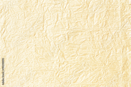 Crumpled yellow background paper texture