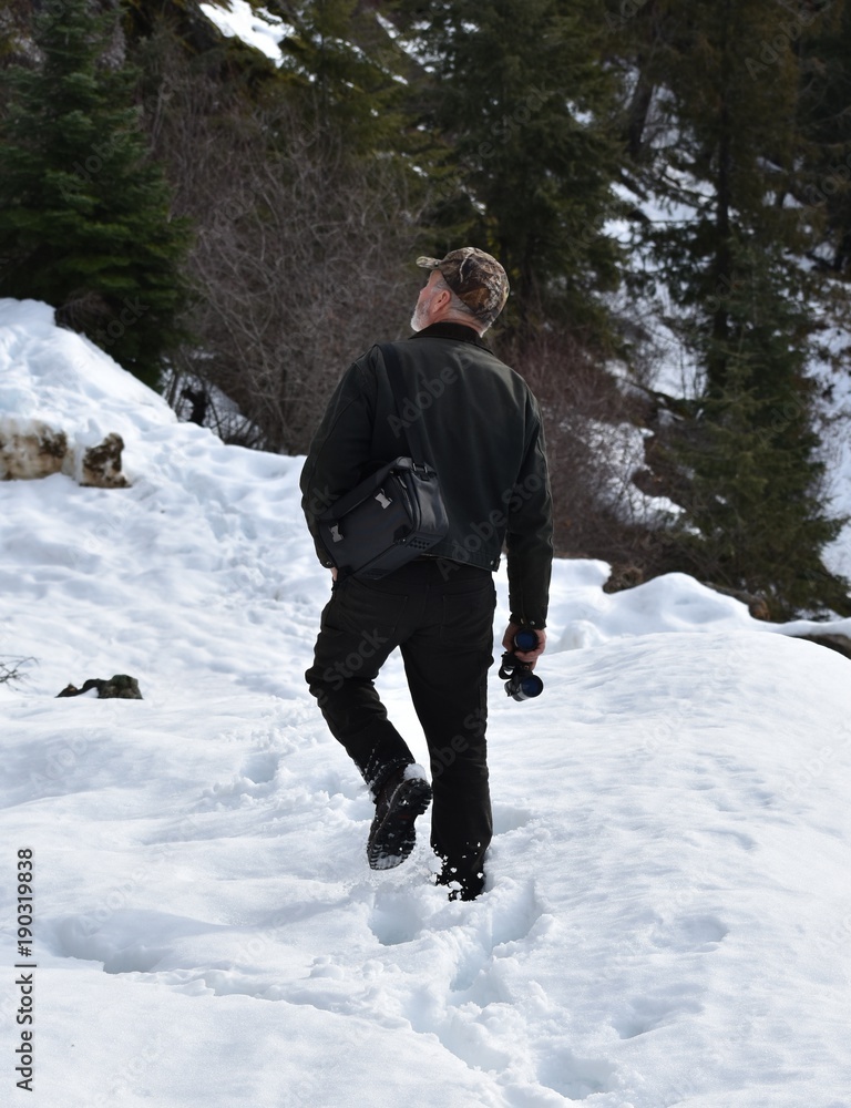 Man hiking through snow