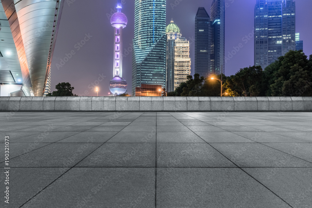 night view of empty brick floor front of shanghai skyline night view of empty brick floor front of shanghai skyline