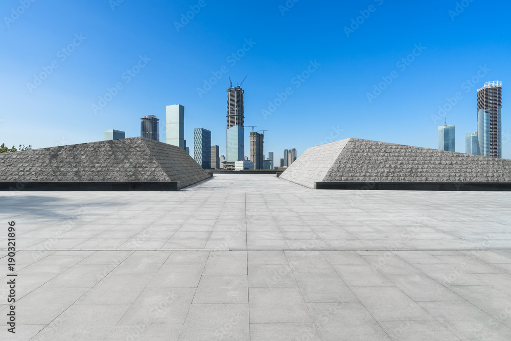 Fototapeta premium Panoramic skyline and buildings with empty square floor.