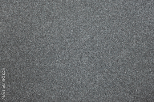 Sandpaper surface. Abrasive material. Sandpaper texture.