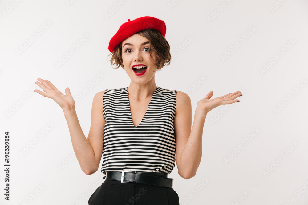 Obraz premium Portrait of a joyful woman dressed in red beret