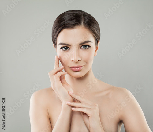 Spa Portrait of Beautiful Woman with Healthy Skin. Nice Model on Background