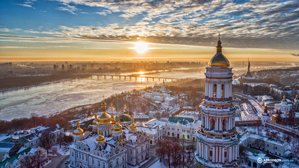 Fotobehang Cappuccinokleur Orange sunset and cloud over cityscape Kiev, Ukraine, Europe  © slava2271
