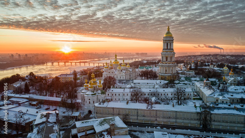 Orange sunset and cloud over cityscape Kiev, Ukraine, Europe photo