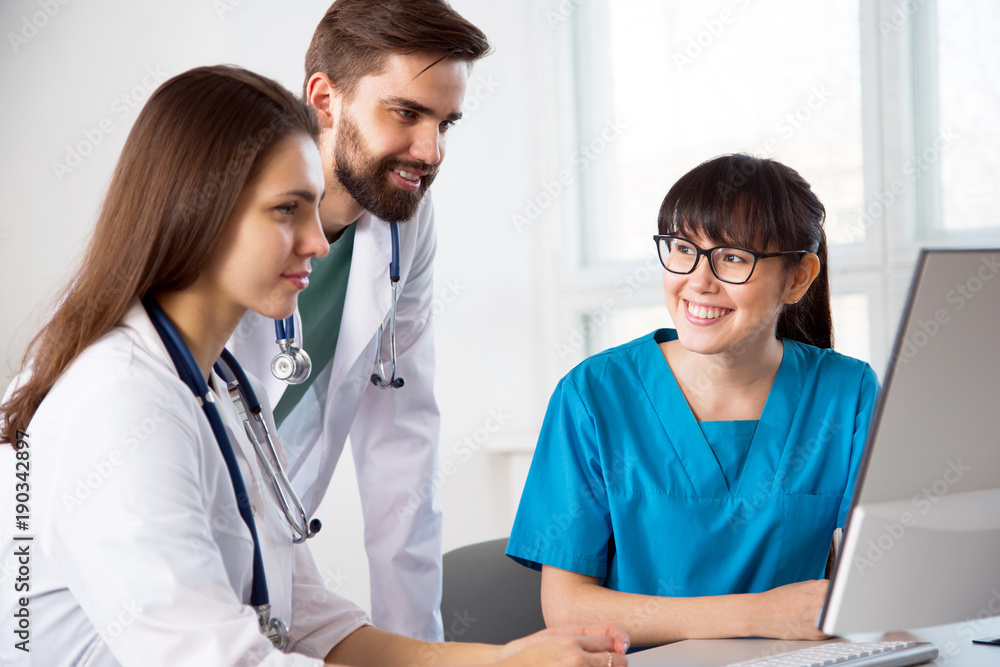 Group of doctors in the clinic Group of doctors in the clinic