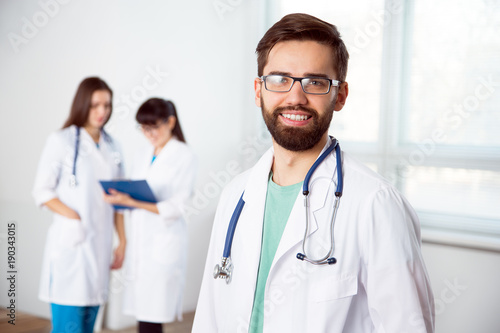 Portrait of a young doctor in a clinic