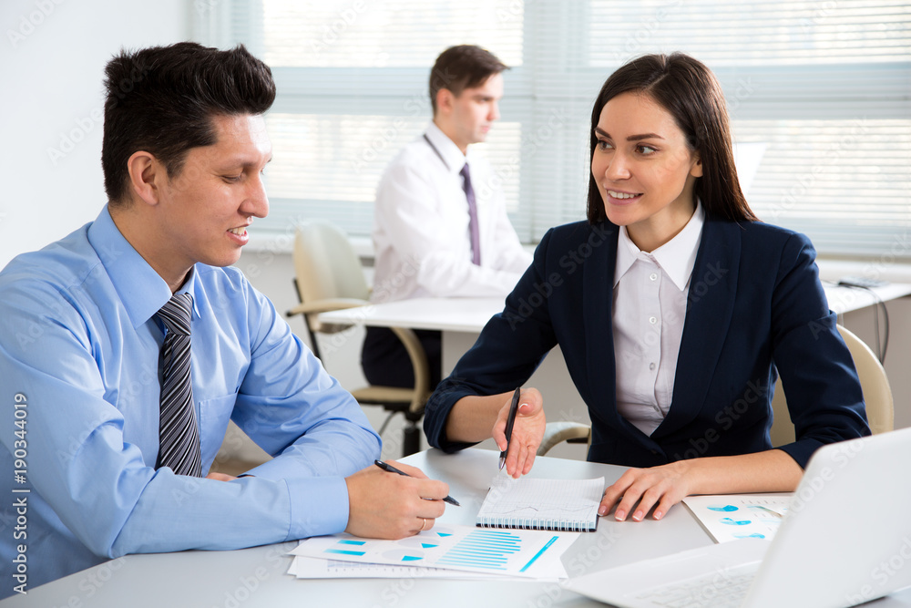 Business people working together in the office Business people working together in the office