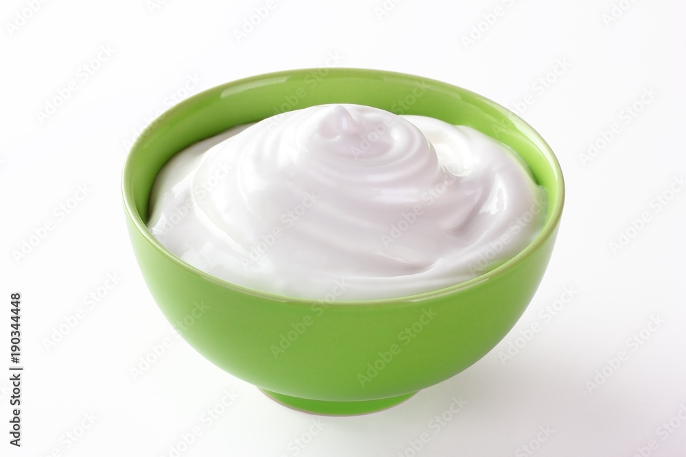 cream sour in a plate isolated white backround cream sour in a plate isolated white backround