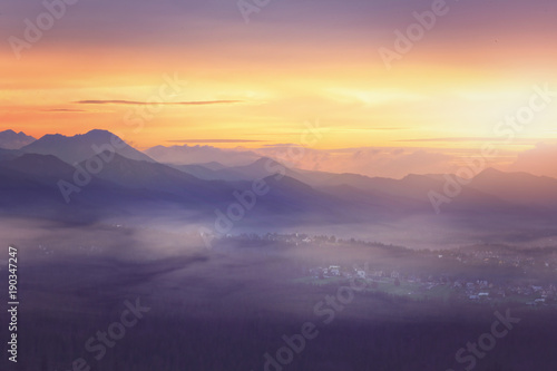 beautiful sunset in a mountainous land © ambrozinio