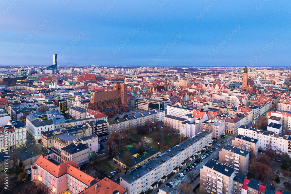 Aerial: Vibrant sunrise over Wroclaw at frosty morning