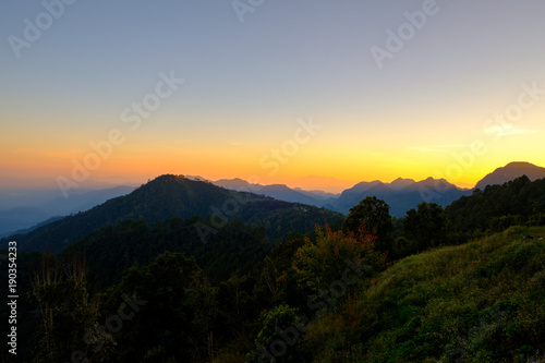 Beautiful mountain landscape at sunset at Monson viewpoint Doi AngKhang, Chaingmai Thailand