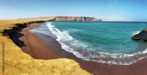 Red sand beach of Paracas National Reserve in Peru photo