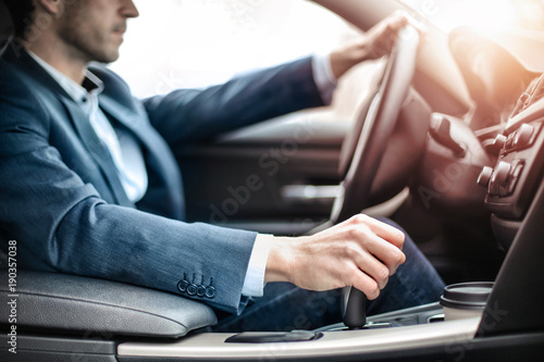Canvastavla Businessman driving a sportive luxury car