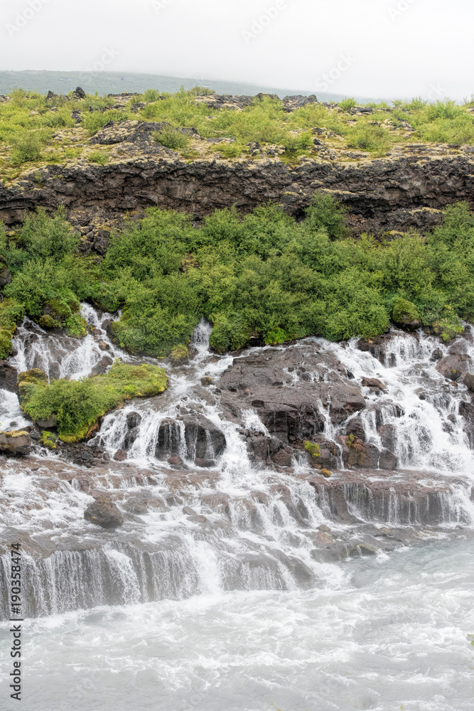 Obraz premium Hraunfossar waterfall