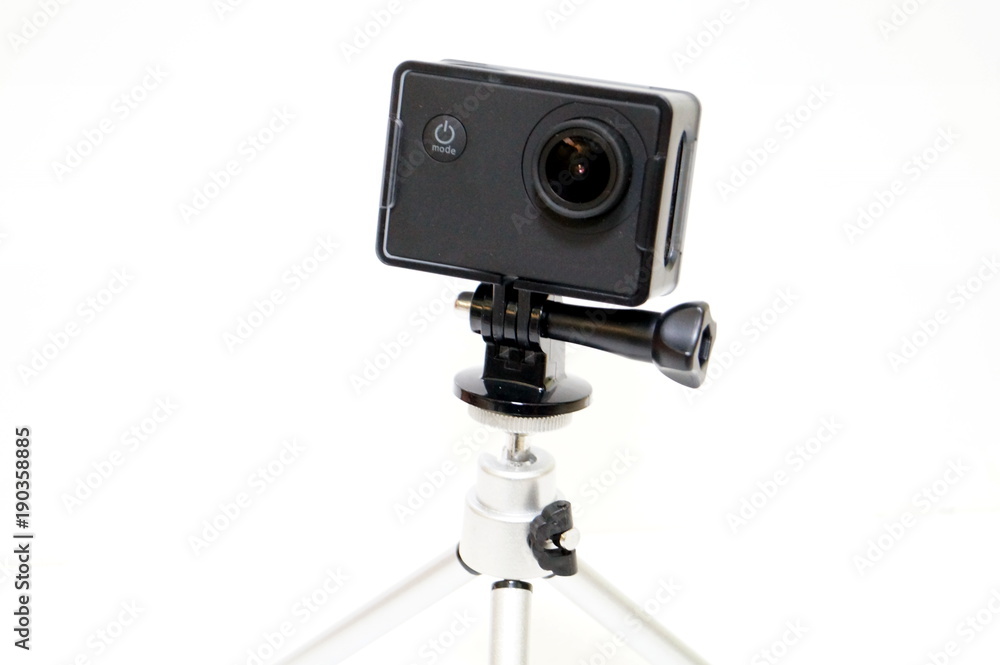 Action camera with tripod