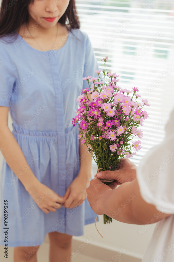 custom made wallpaper toronto digitalCouple in love. Romantic man giving flowers to his girlfriend